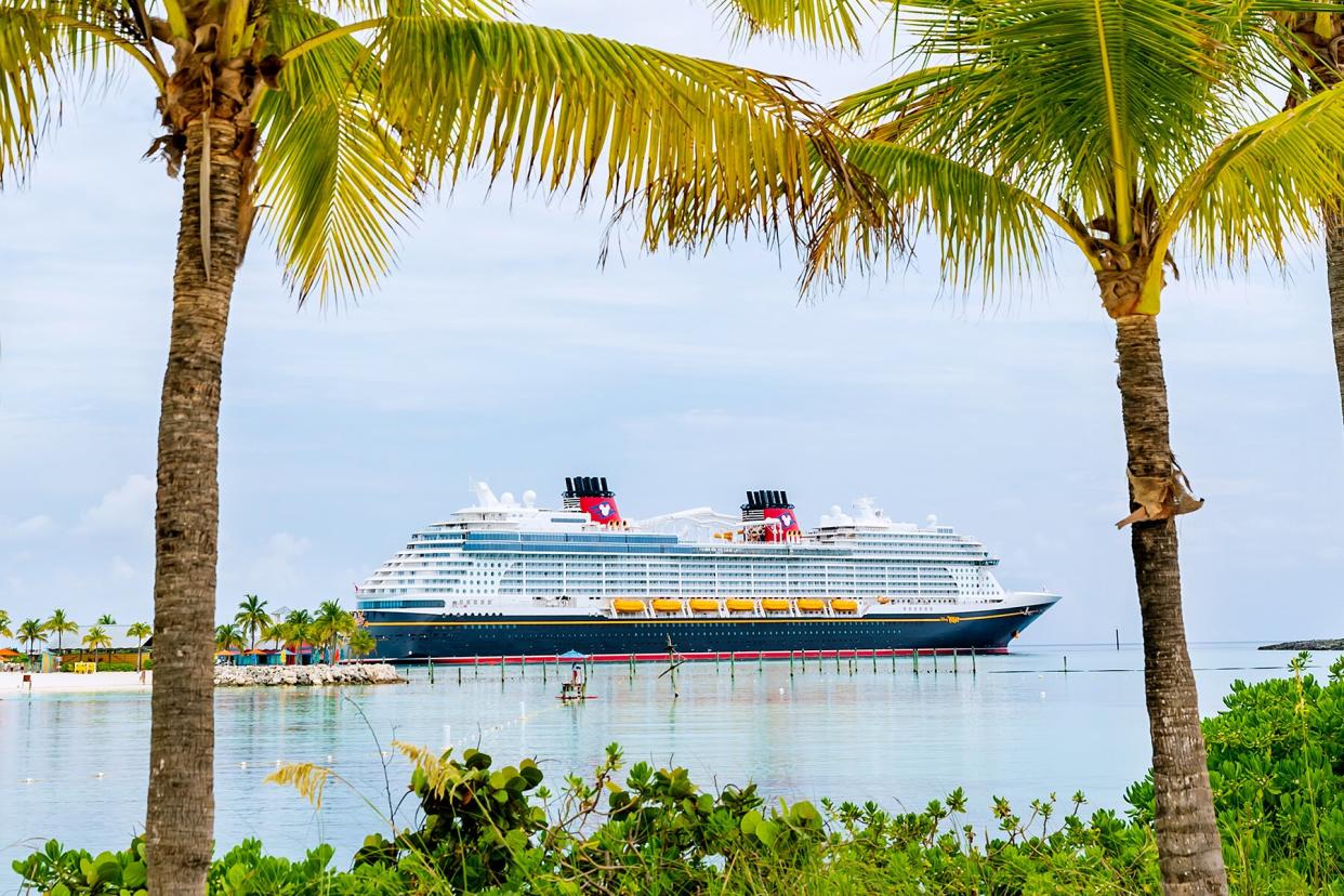 The Disney Wish sailing by Disney’s private island paradise, Castaway Cay