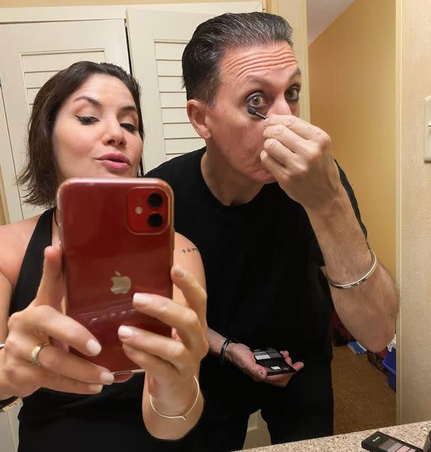 The author and Romy putting on their makeup together. (Photo: Courtesy of Adam Jesse Burns)