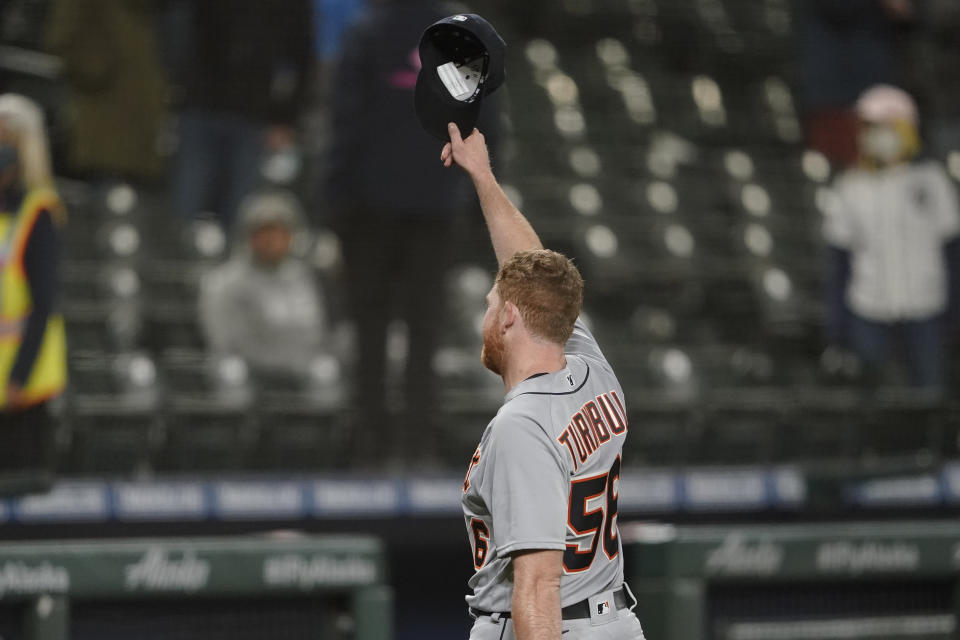 Detroit Tigers starting pitcher Spencer Turnbull tips his cap to the crowd after he threw a no-hitter baseball game against the Seattle Mariners, Tuesday, May 18, 2021, in Seattle. The Tigers won 5-0. (AP Photo/Ted S. Warren)