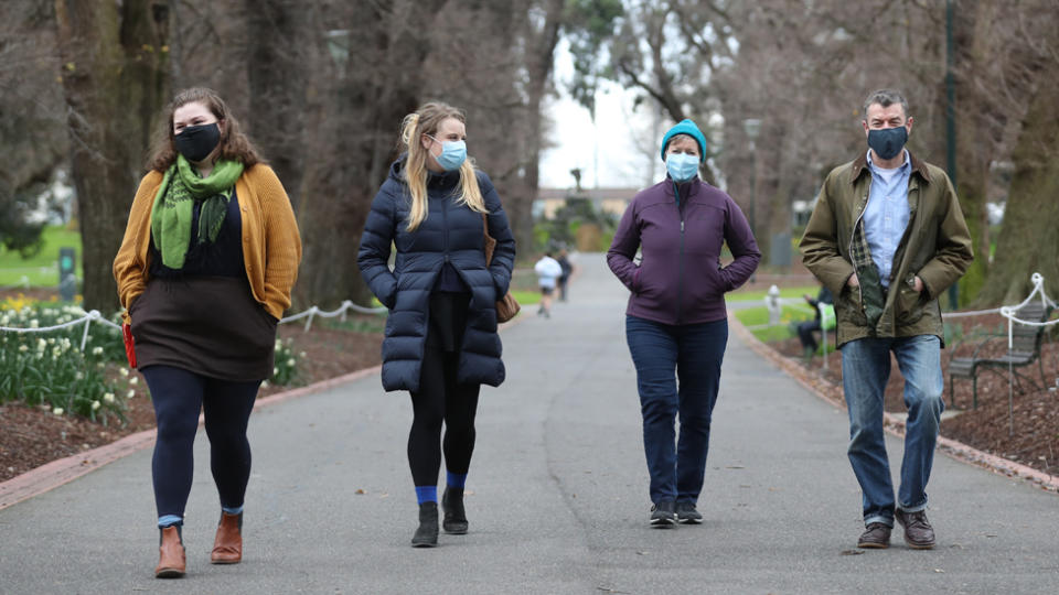 Melbourne locals wearing mandatory face masks