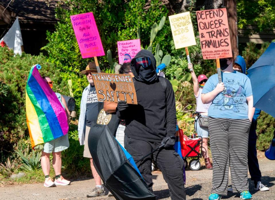 LGBTQ activists counter-protested a parents’ rights “War on Children” rally near Gov. Gavin Newsom’s home in Fair Oaks on Saturday.