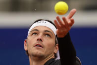 Taylor Fritz of the United States serves the ball during the final match against Jan-Lennard Struff of Germany at the Tennis ATP tournament in Munich, Germany, Sunday, April 21, 2024. (AP Photo/Matthias Schrader)