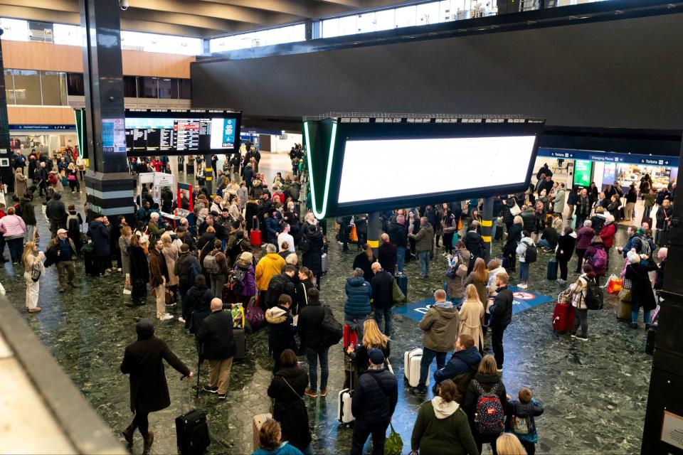 Passengers at Euston station in January (PA)