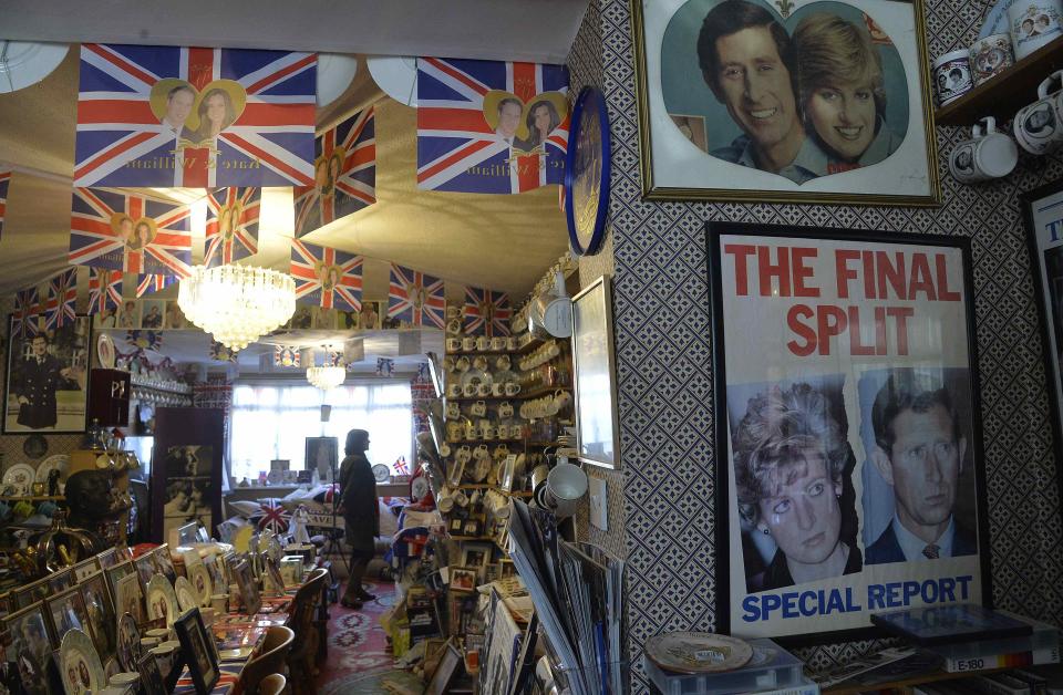 A visitor views royal paraphernalia in the house of Margaret Tyler in west London