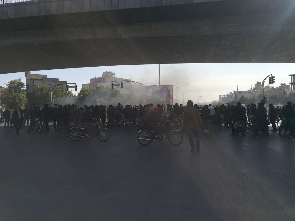 Streets are blocked in a protest after authorities raised gasoline prices, in the central city of Isfahan, Iran, Saturday, Nov. 16, 2019. Protesters angered by Iran raising government-set gasoline prices by 50% blocked traffic in major cities and occasionally clashed with police Saturday after a night of demonstrations punctuated by gunfire, in violence that reportedly killed at least one person. (AP Photo)