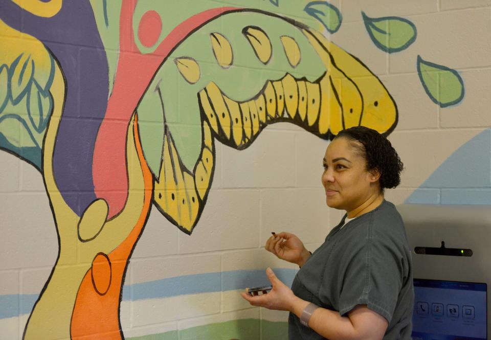 Jessica and other female Barnstable County Correctional Facility inmates were working on a "Metamorphosis" mural Monday. The project is part of an art therapy program taught by the Cultural Center of Cape Cod in South Yarmouth.