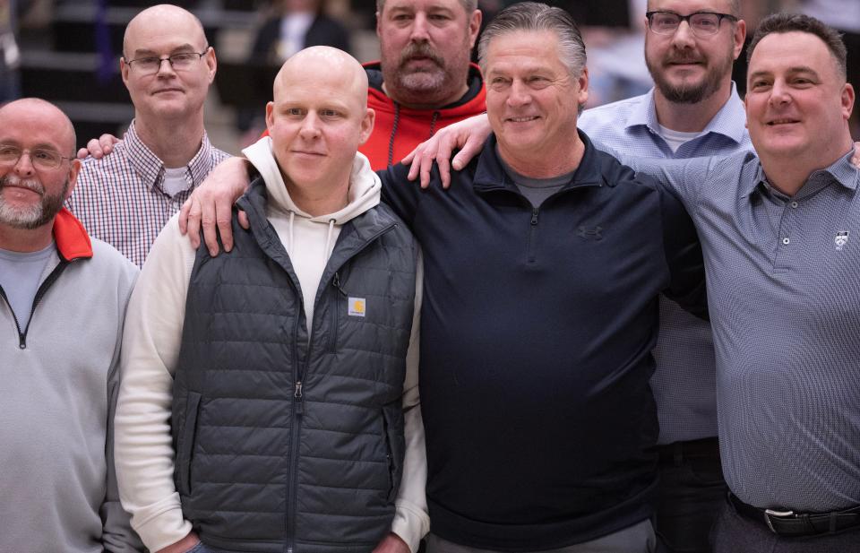 The 1993-94 Jackson boys basketball state final four team, including star player Jami Bosley and head coach Larry Taylor, was honored before the Wadsworth at Jackson boys varsity basketball game on Tuesday, Feb.13, 2024.