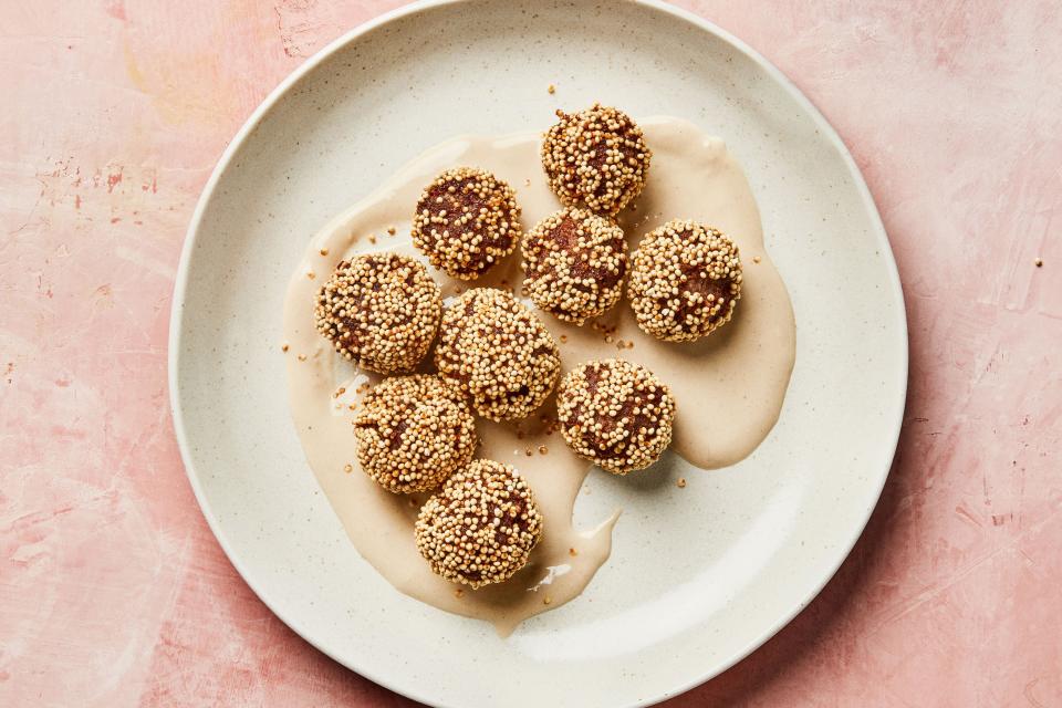 <h1 class="title">Meatballs with Millet, Coriander, and Tahini Sauce</h1><cite class="credit">Photo by Chelsie Craig, Styling by Molly Baz</cite>