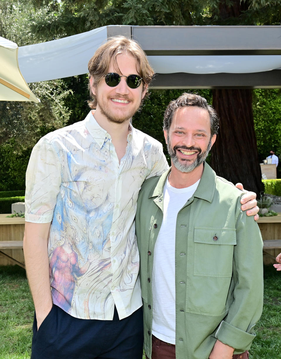 Bo Burnham and Nick Kroll posing together outside