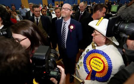 UKIP leader Paul Nuttall (C) reacts after losing the Stoke Central by-election in Stoke on Trent, February 24, 2017. REUTERS/Darren Staples