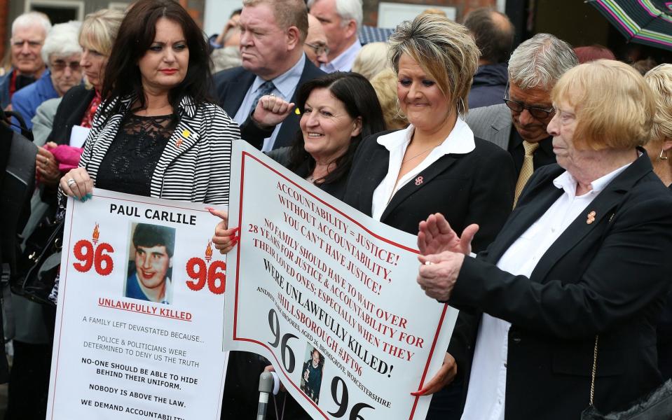  Family members of the 96 Hillsborough victims show their feeling after a meeting with Sue Hemming, Head of the Crown Prosecution Service (CPS) Special Crime and Counter Terrorism Division, in Warrington - Credit: NIGEL RODDIS/EPA