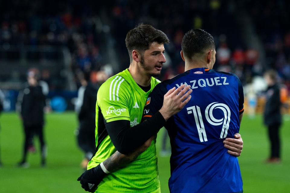 FC Cincinnati goalkeeper Roman Celentano (18) embraces FC Cincinnati forward Brandon Vázquez (19) after the MLS Easter Conference semifinal match at Paycor Stadium in Cincinnati on Saturday, Nov. 25, 2023. FC Cincinnati defeated Philadelphia Union 1-0.