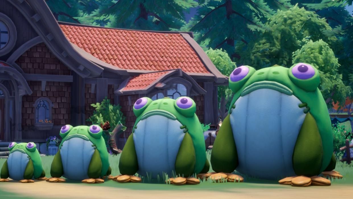  Palia - four frog plushies of increasing size, nearly as tall as a house. 