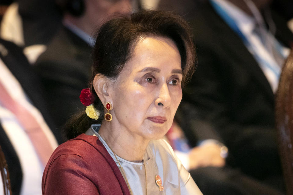 FILE - In this Nov. 3, 2019, file photo, Myanmar's leader Aung San Suu Kyi participates in ASEAN-U.N. summit in Nonthaburi, Thailand. Southeast Asian leaders are meeting on Oct. 26-28, 2021 for their annual summit where Myanmar’s top general, whose forces seized power in February and shattered one of Asia’s most phenomenal democratic transitions, has been shut out for refusing to take steps to end the deadly violence. Singapore’s foreign minister declared that his government still recognizes Suu Kyi and ousted President Win Myint, both of whom have been detained, as Myanmar’s legitimate leaders, according to the diplomat. (AP Photo/Wason Wanichakorn, File)