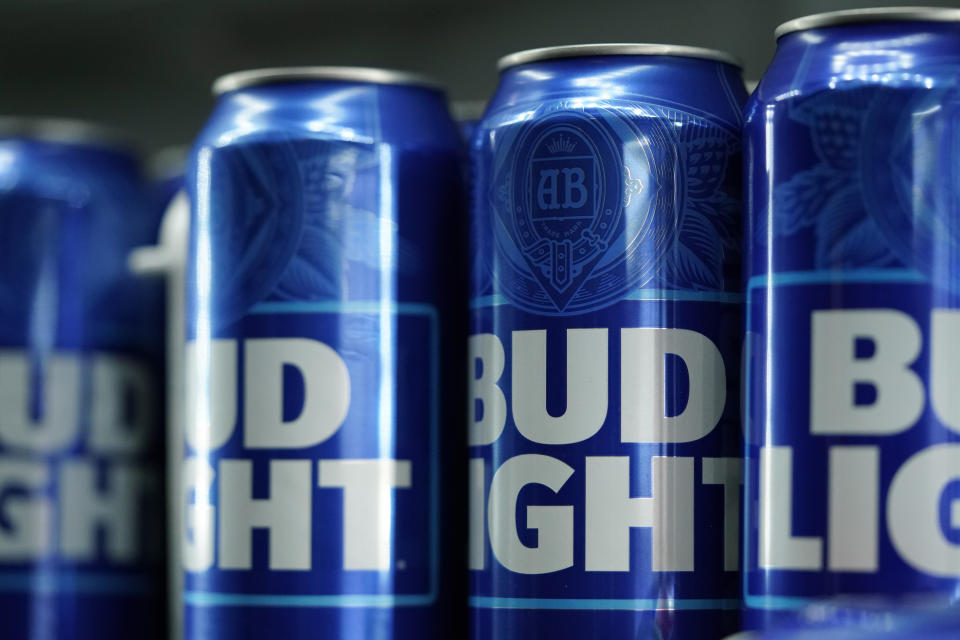 FILE - Cans of Bud Light beer are seen before a baseball game between the Philadelphia Phillies and the Seattle Mariners on April 25, 2023, in Philadelphia. The country's largest advocacy group for LGBTQ+ rights has suspended its benchmark equality and inclusion rating for Anheuser-Busch, citing the beer company's handling of hate-filled and transphobic backlash received after its partnership with transgender influencer Dylan Mulvaney in April. (AP Photo/Matt Slocum, File)