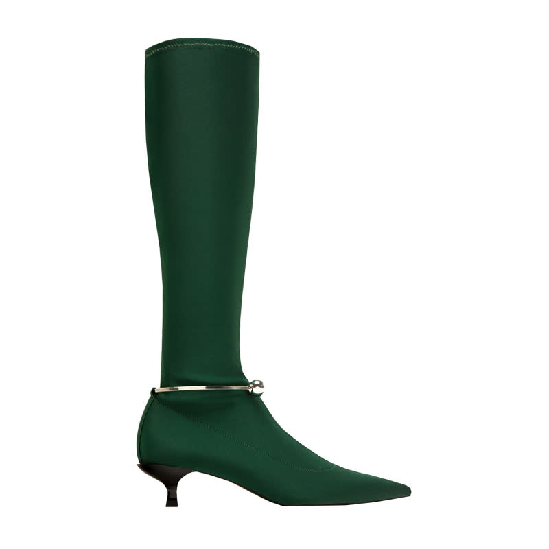 <a rel="nofollow noopener" href="https://www.zara.com/us/en/sock-boots-with-metal-detail-p17113201.html?v1=4989016&v2=288001" target="_blank" data-ylk="slk:Sock Boots With Metal Detail, Zara, $70;elm:context_link;itc:0;sec:content-canvas" class="link ">Sock Boots With Metal Detail, Zara, $70</a>