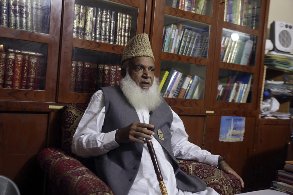 In this Tuesday, Nov. 6, 2018, photo, Pakistani cleric Muhammad Afzal Qadri, leader in the Tehreek-e-Labbaik Party talks about Christian woman Asia Bibi, in Gujrat, Pakistan. The Christian woman acquitted after eight years on death row for blasphemy was released but her whereabouts in Islamabad on Thursday, Nov. 8 remained a closely guarded secret in the wake of demands by radical Islamists that she be publicly executed. Following her acquittal, the hard-line Tehreek-e-Labbaik Party forced a country-wide shut down as their supporters took to the streets for three days to protest Bibi's release. (AP Photo/K.M. Chaudary)