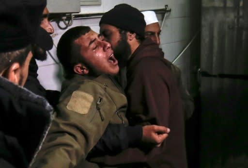 A relative of Hamas militant Mohammed al-Nabaheen, who Gaza officials said was killed by Israeli tank fire, reacts at a hospital in the enclave on January 22, 2019