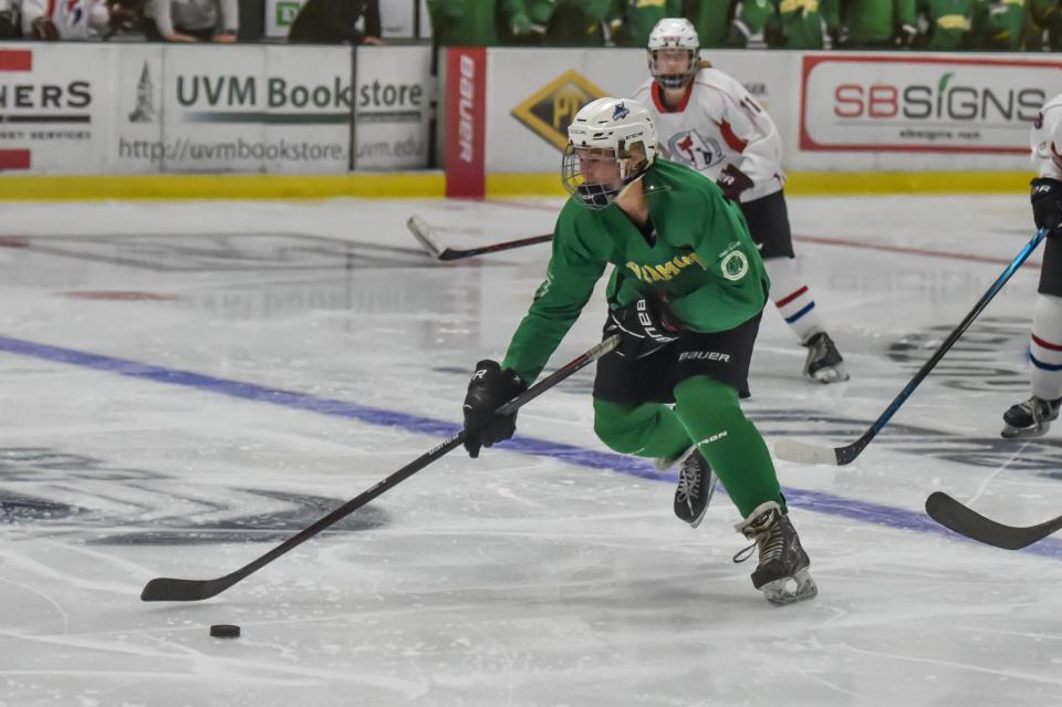 Vermont's Tess Everett rushes toward the goal during the Make-A-Wish All-Star Hockey Classic between Vermont and New Hampshire on Saturday afternoon at UVM's Gutterson Fieldhouse.