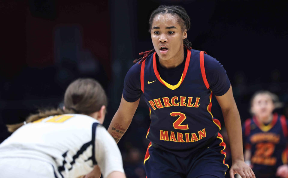 Purcell Marian's Dee Alexander (2) and the Cavaliers are putting together and impressive first half against Copley in a Division II state semifinal