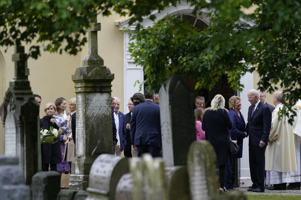 President Joe Biden, right, visits with an attendee as he departs Mass at St. Joseph on the Brandywine Catholic Church, Sunday, May 30, 2021, in Wilmington, Del. (AP Photo/Patrick Semansky)