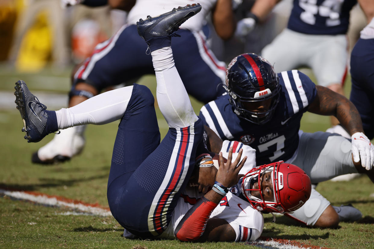 Liberty Flames quarterback Malik Willis (7) was sacked nine times in a loss at Mississippi. (Photo by Joe Robbins/Icon Sportswire via Getty Images)