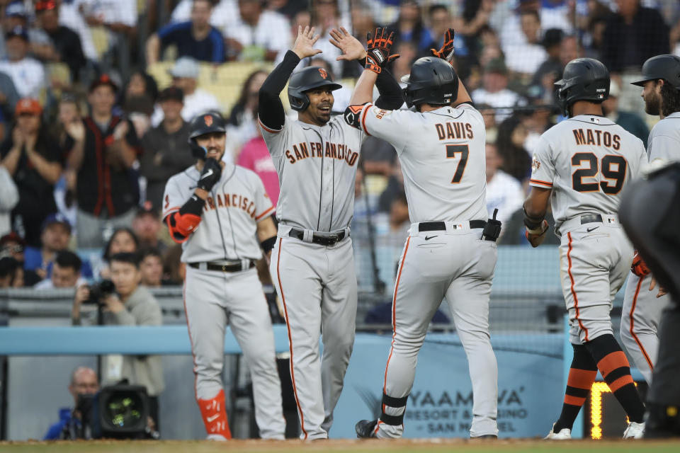 LOS ANGELES, CALIFORNIA - JUNE 17: J.D. Davis #7 of the San Francisco Giants celebrates after hitting a grand slam in the sixth inning against the Los Angeles Dodgers at Dodger Stadium on June 17, 2023 in Los Angeles, California. (Photo by Meg Oliphant/Getty Images)