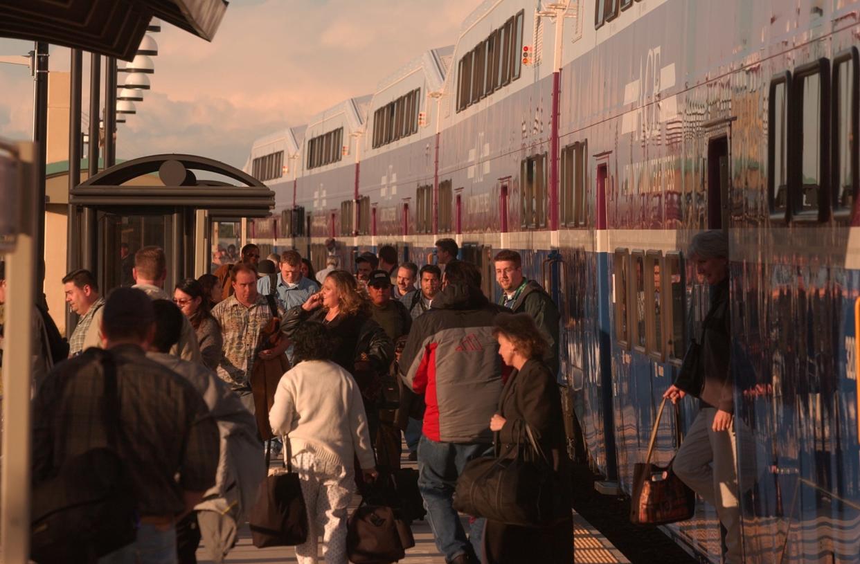 Passengers disembark from the Altamont Commuter Express train at the Lathrop-Manteca Station. Valley Link, a train project that would connect the East Bay to the San Joaquin Valley, is in the running for $450 million in federal funds.