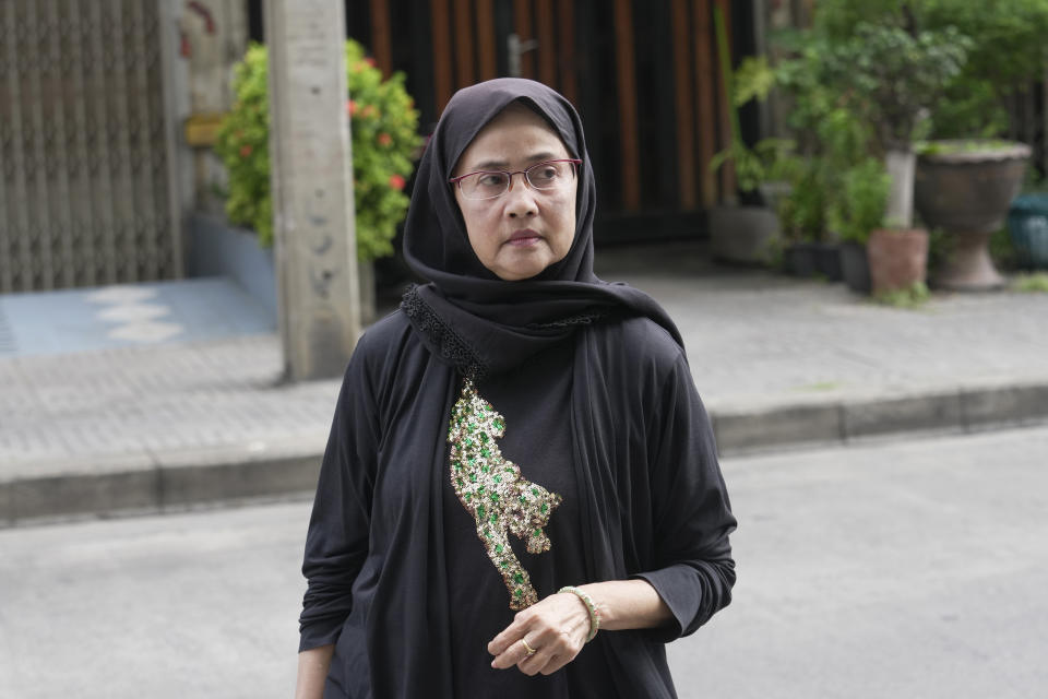 Angkhana Neelapaijit arrives at Southern Criminal Court in Bangkok, Thailand, Tuesday, Aug. 29, 2023. Three human rights activists including Angkhana were acquitted Tuesday of criminally defaming a Thai poultry company with social media posts that supported activists who accused the company of abusive labor practices, according to three defendants and their lawyer. (AP Photo/Sakchai Lalit)