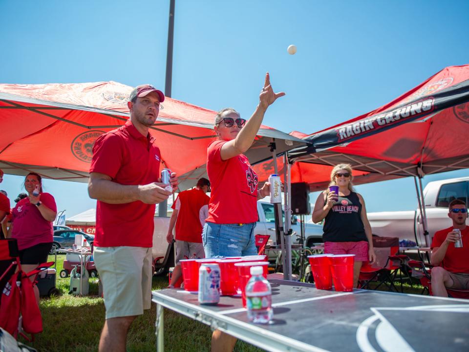 Fans tailgate before the Ragin Cajuns take on Nicholls in 2021.