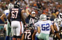 Referee Walt Anderson #66 makes a call as the Chicago Bears play against the Dallas Cowboys at Cowboys Stadium on October 1, 2012 in Arlington, Texas. (Photo by Ronald Martinez/Getty Images)