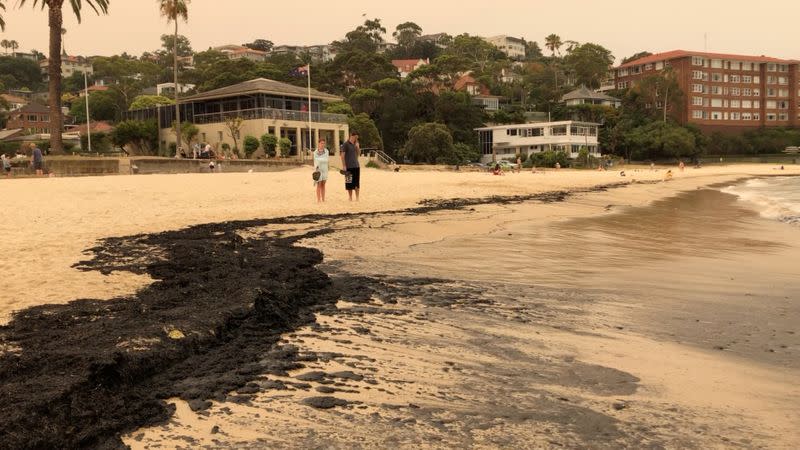 Ash from bushfires that affected New South Wales in the last days is seen on Balmoral Beach in Sydney