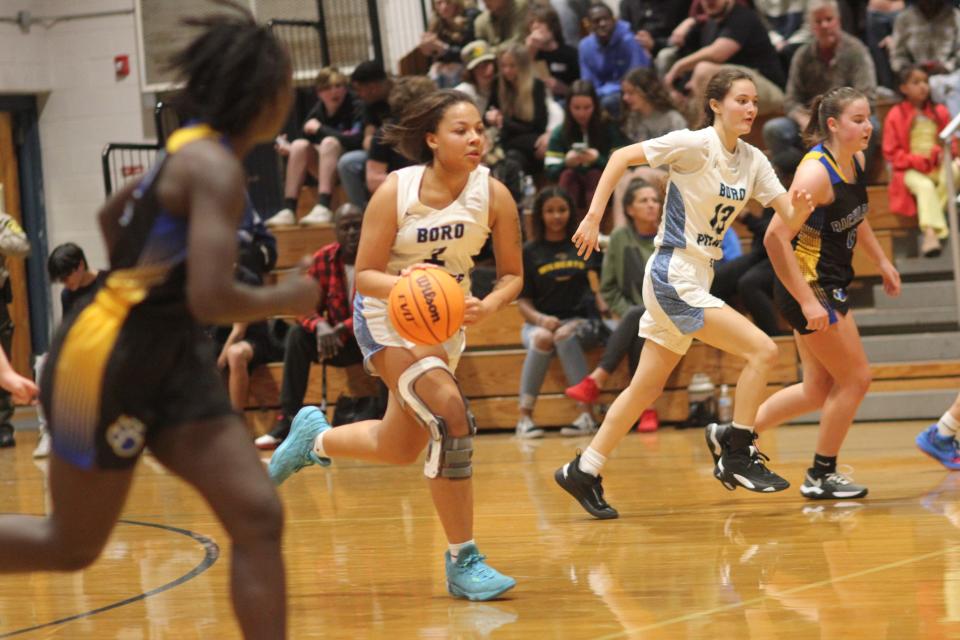 Swansboro's Erica Johnson pushes the ball up the court against Richlands on Tuesday night.