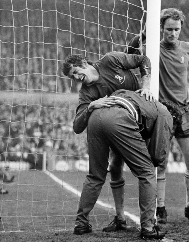 Chelsea keeper Peter Bonetti receiving treatment after clashing with Mick Jones in the FA Cup final replay.