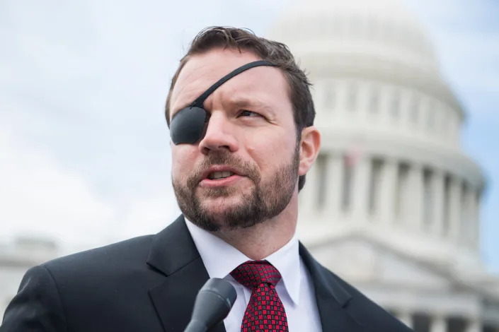 Rep. Dan Crenshaw, a Republican of Texas, stands outside the US Capitol