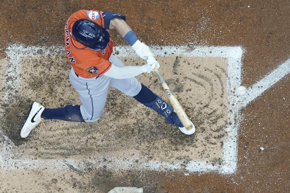 Houston Astros' Alex Bregman hits a double during the sixth inning of a baseball game against the Milwaukee Brewers Wednesday, May 24, 2023, in Milwaukee. (AP Photo/Morry Gash)