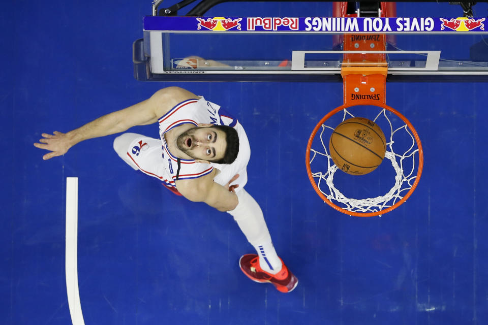 Philadelphia 76ers' Furkan Korkmaz watches his shot during the first half of an NBA basketball game against the Chicago Bulls, Sunday, Feb. 9, 2020, in Philadelphia. (AP Photo/Matt Slocum)