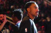 Atlanta Hawks guard Jeff Teague looks on as teammates are introduced before an NBA basketball game against the Detroit Pistons, Saturday, Jan. 18, 2020, in Atlanta. (AP Photo/John Amis)