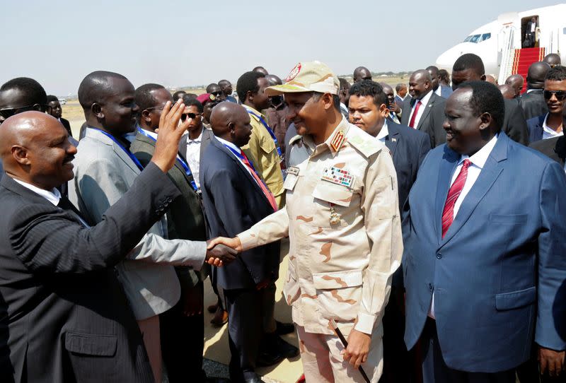 Lieutenant General Mohamed Hamdan Dagalo, deputy head of the military council and head of the RSF, is received as he arrives in the Juba International Airport in Juba