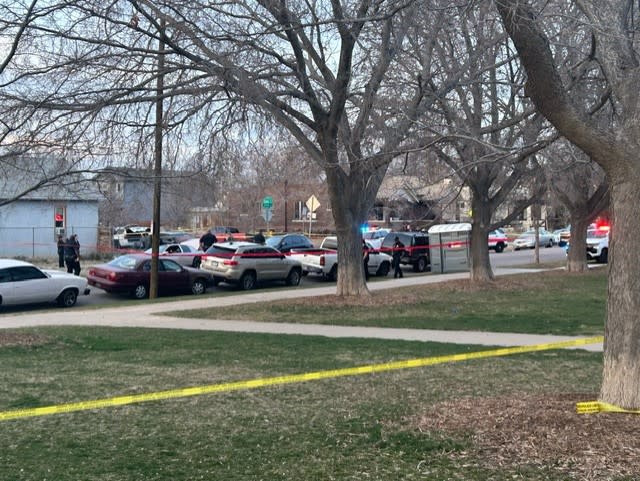 Police tape marks the scene of a shooting near 29th Avenue and Gilpin Street in Denver on March 30, 2024.