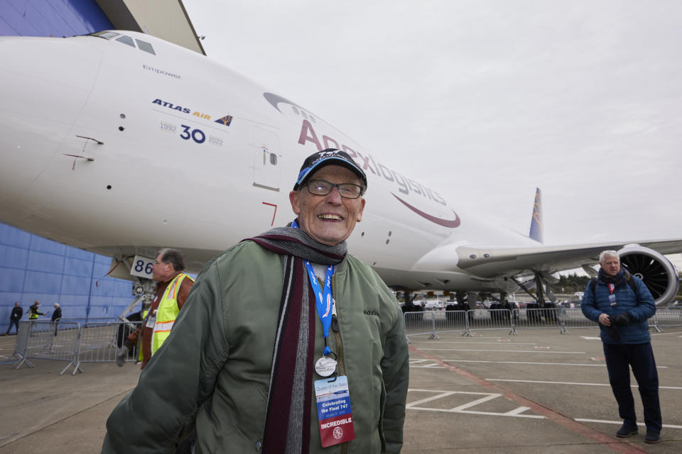 Desi Evans, 92, laughs as he talks about working on the first 747 over 50-years ago before a ceremony for the delivery of the final Boeing 747 jumbo jet, Tuesday, Jan. 31, 2023, in Everett, Wash. Since it debuted in 1969, the 747 has served as a cargo plane, a commercial aircraft capable of carrying nearly 500 passengers, and the Air Force One presidential aircraft. (AP Photo/John Froschauer)