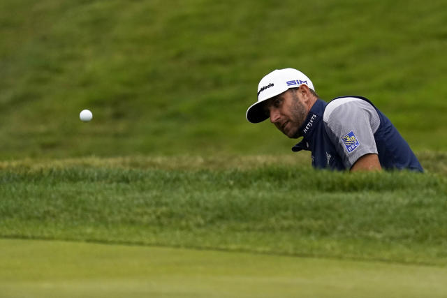 Dustin Johnson hits from the bunker on the eighth hole during the final round of the PGA Championship golf tournament at TPC Harding Park Sunday, Aug. 9, 2020, in San Francisco. (AP Photo/Jeff Chiu)