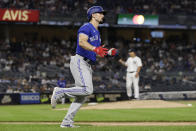 Toronto Blue Jays' Randal Grichuk reacts as he rounds first base after hitting a home run off New York Yankees pitcher Nestor Cortes Jr. during the fifth inning of a baseball game Thursday, Sept. 9, 2021, in New York. (AP Photo/Adam Hunger)