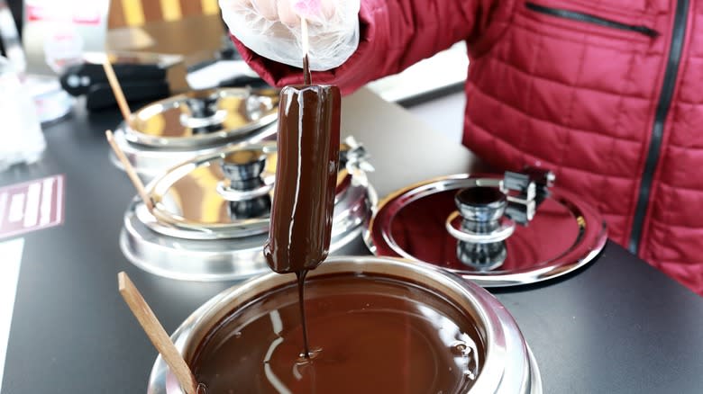 dipping ice cream in chocolate