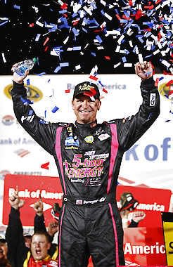 Clint Bowyer celebrates in Victory Lane after winning the Bank of America 500 at Charlotte Motor Speedway in 2012.