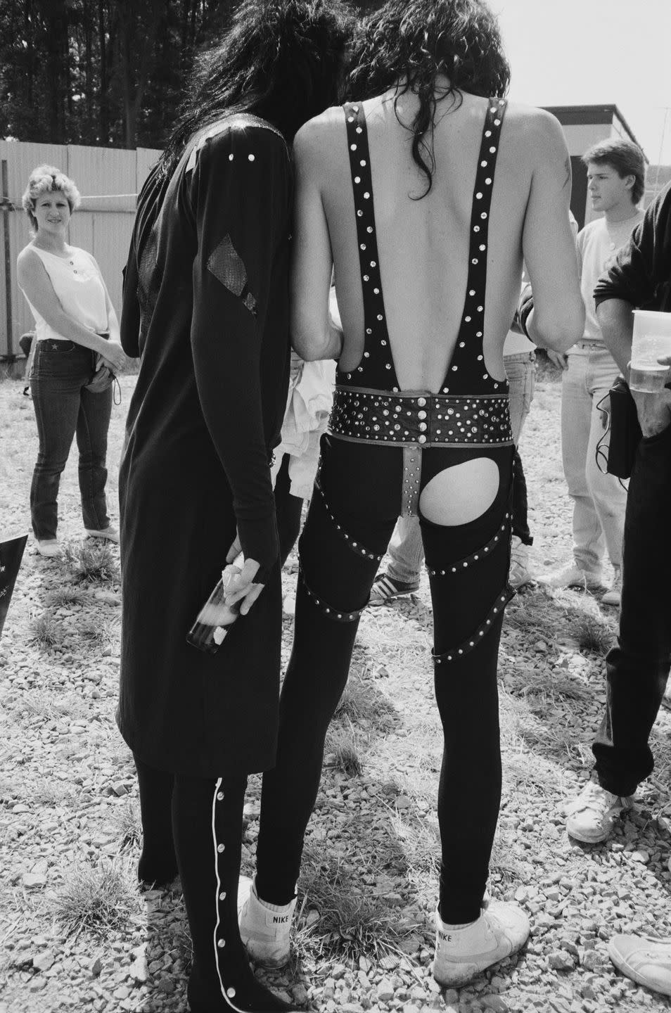 <p>Sixx and Lee backstage at the Monsters of Rock Festival on August 18, 1984 in just one example of their unique fashion choices. </p>