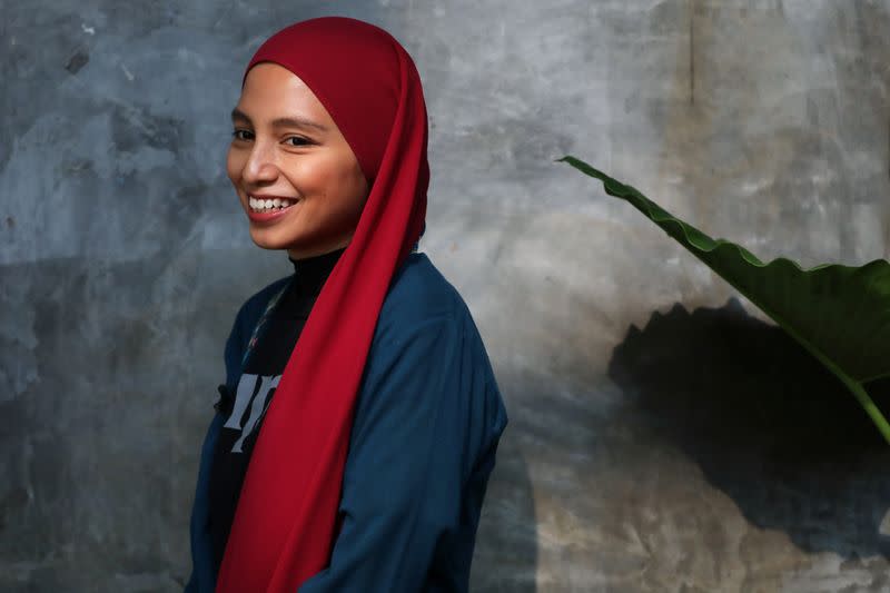 Malaysian artist Wani Ardy smiles during an interview with Reuters, in Shah Alam