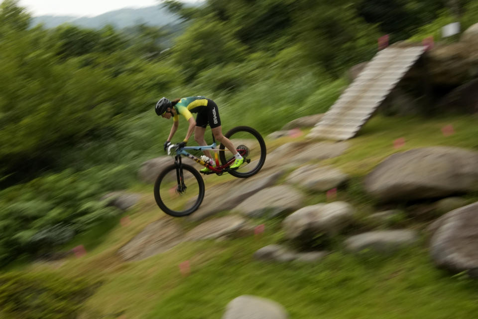 Jaqueline Mourao of Brazil competes during the women's cross-country mountain bike competition at the 2020 Summer Olympics, Tuesday, July 27, 2021, in Izu, Japan. (AP Photo/Christophe Ena)