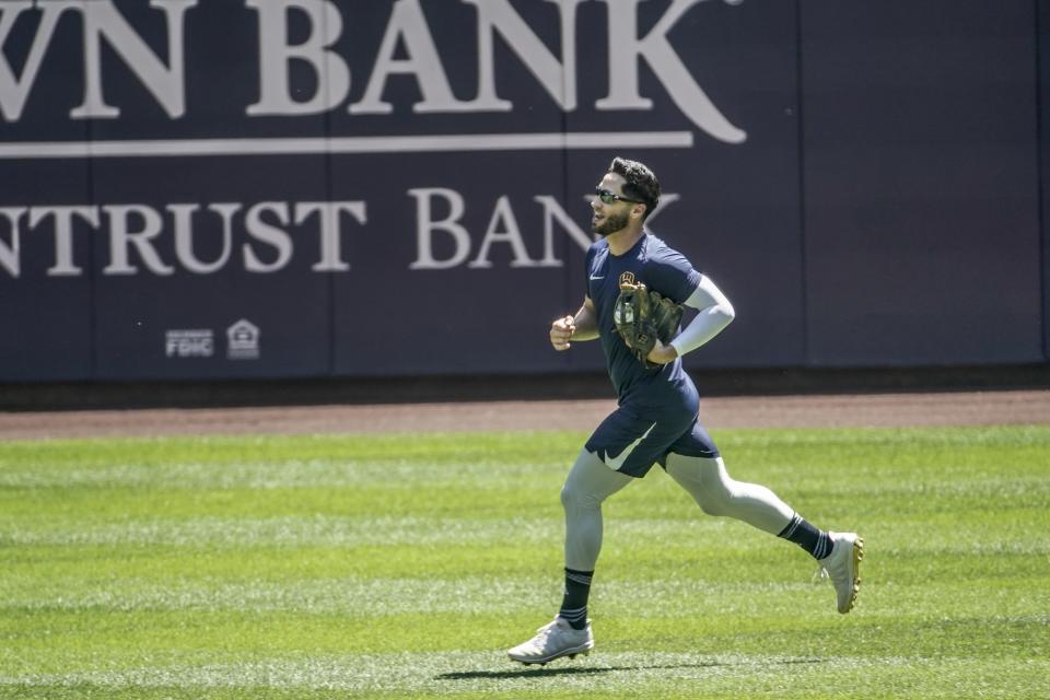 Milwaukee Brewers' Ryan Braun runs during a practice session Saturday, July 4, 2020, at Miller Park in Milwaukee. (AP Photo/Morry Gash)