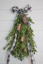 <p>All you need are some vintage bells, boxwood trimmings, a wire hanger, and some ribbon (along with a few other supplies you probably already have around the house) to make this pretty swag. </p><p><strong><em>Get the tutorial <a href="https://thehoneycombhome.com/christmas-door-decorations-diy-boxwood-swag/" rel="nofollow noopener" target="_blank" data-ylk="slk:The Honeycomb Home" class="link rapid-noclick-resp">The Honeycomb Home</a>. </em></strong></p><p><a class="link rapid-noclick-resp" href="https://www.amazon.com/Anezus-Fishing-String-Fluorocarbon-Monofilament/dp/B07J62FVCV?tag=syn-yahoo-20&ascsubtag=%5Bartid%7C10070.g.1330%5Bsrc%7Cyahoo-us" rel="nofollow noopener" target="_blank" data-ylk="slk:SHOP FISHING WIRE">SHOP FISHING WIRE</a></p>